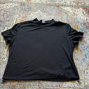 Black cropped mock neck top